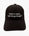 Premium black 6-panel gym caps with bold slogans