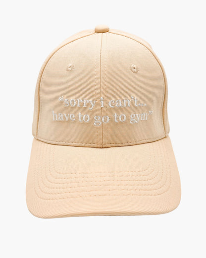 Premium beige 6-panel gym caps with bold slogans