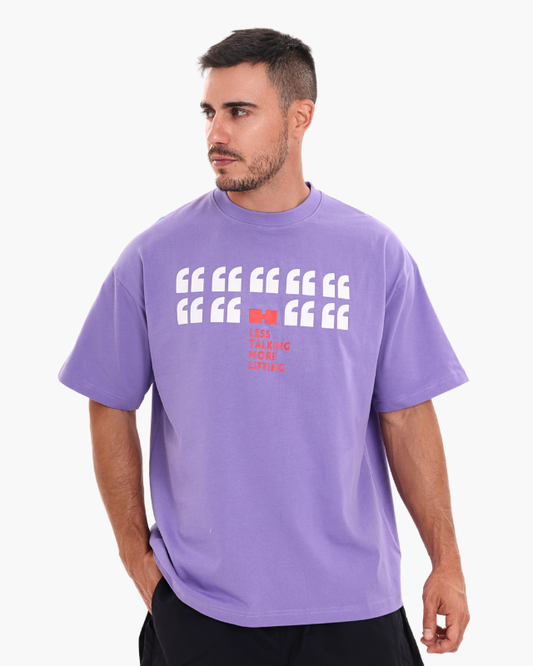 Man wearing a purple oversized unisex t-shirt front